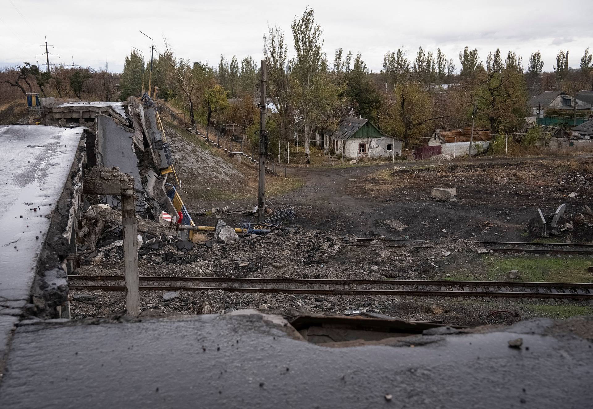 A view shows a destroyed bridge in the town of Pokrovsk