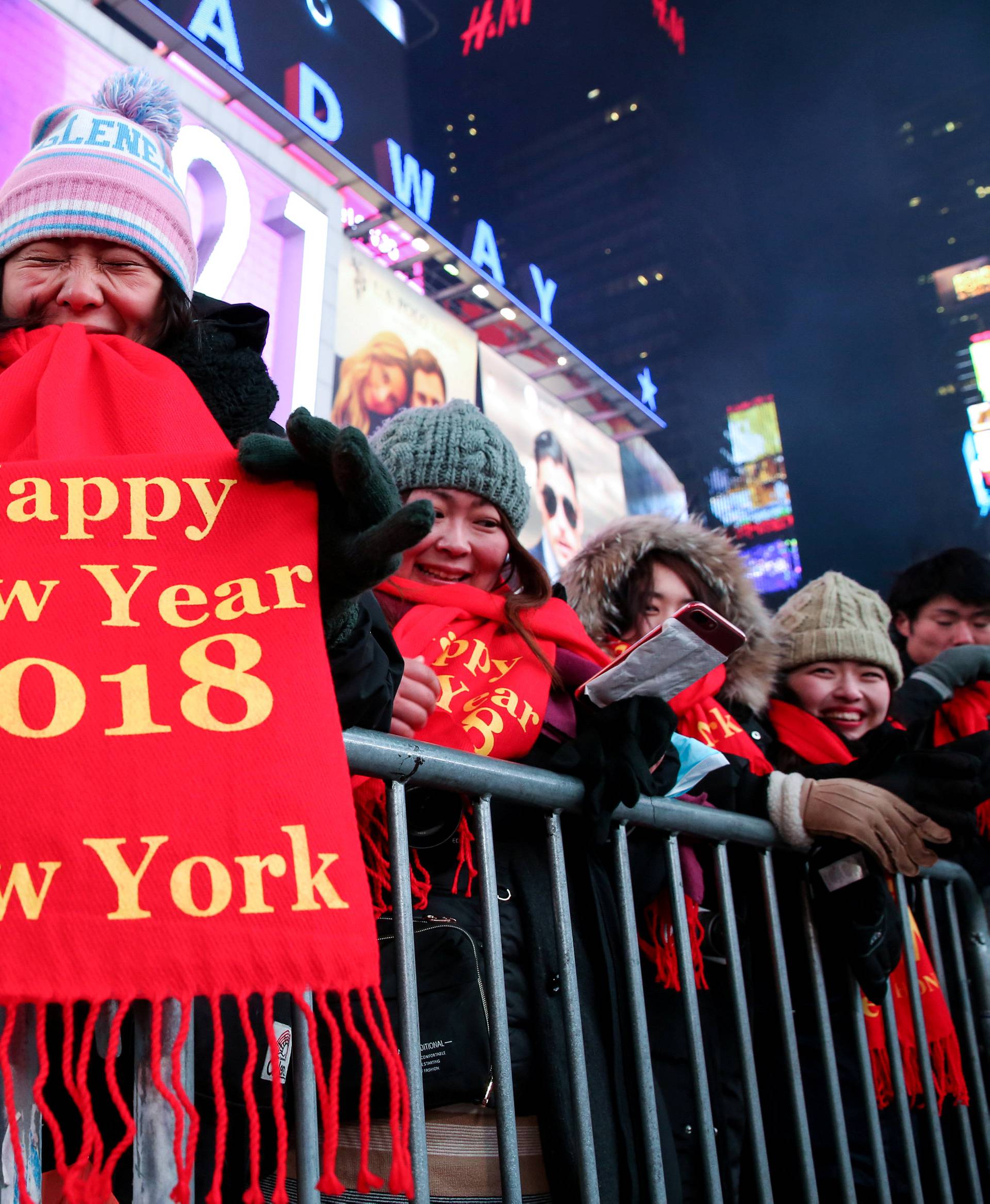 Revelers gather in Times Square ahead of the New Year's Eve celebrations in New York