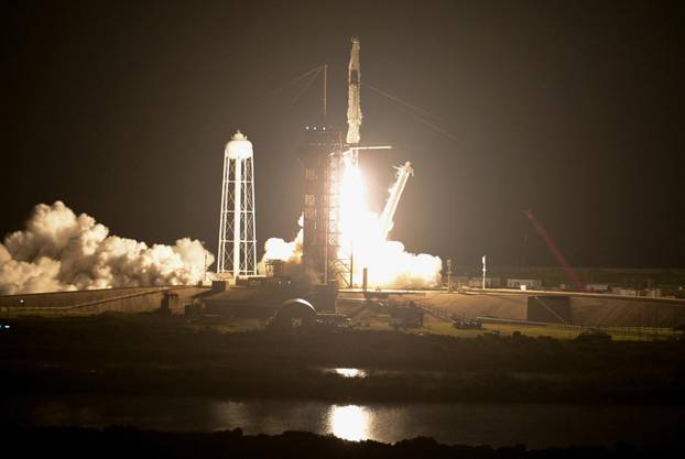 A SpaceX Falcon 9 rocket lifts off carrying four astronauts on a six-month expedition to the International Space Station, at Cape Canaveral