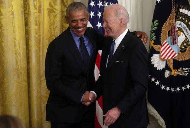 U.S. President Biden and former U.S. President Obama speak about the Affordable Care Act and Medicaid at the White House