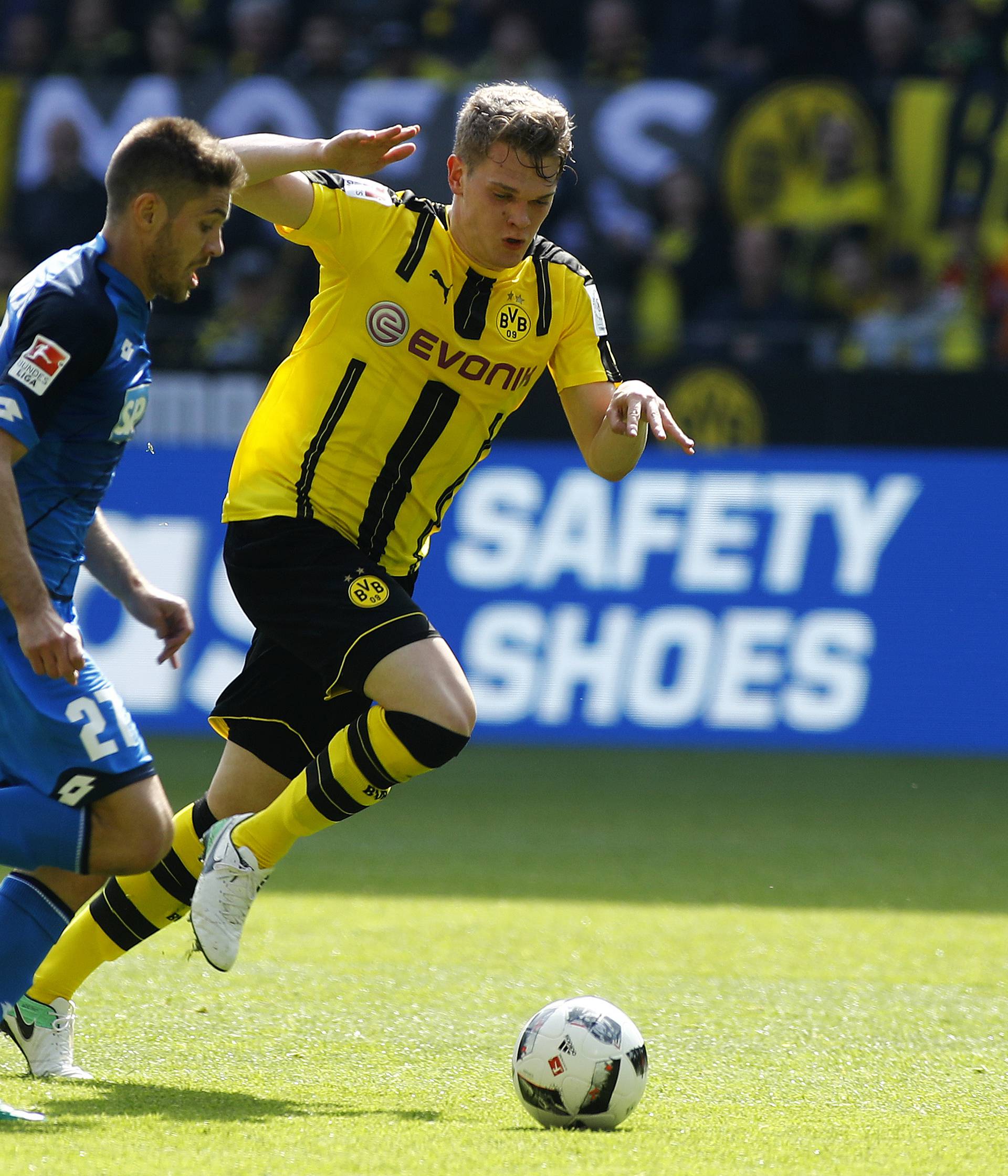 TSG Hoffenheim's Andrej Kramaric in action with Borussia Dortmund's Matthias Ginter