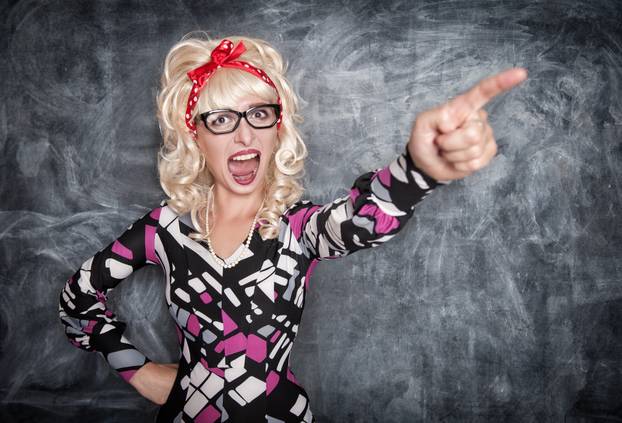 Angry screaming retro teacher pointing out 