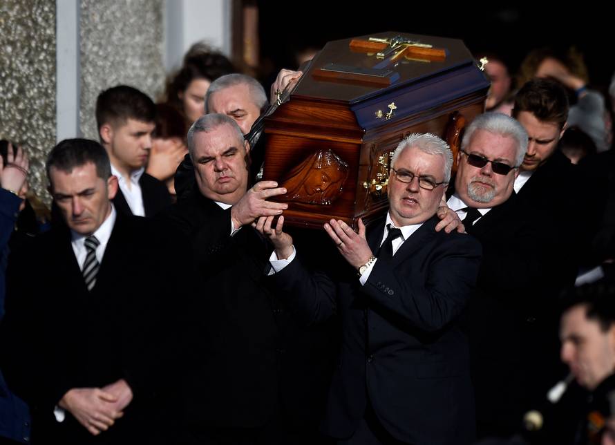 Dolores O'Riordan's coffin is carried out of her funeral at St Ailbe's Church in Ballybricken