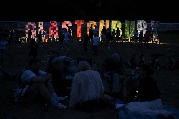 Revellers attend Glastonbury Festival at Worthy Farm in Pilton, Somerset, Britain