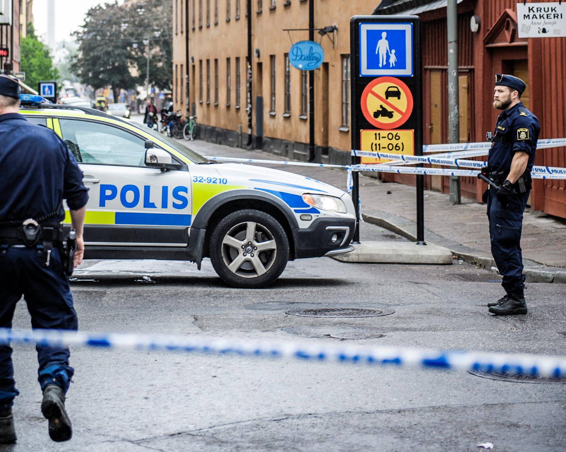 Truck driver is on the run after crashing into taxi, in the Sodermalm district, in Stockholm