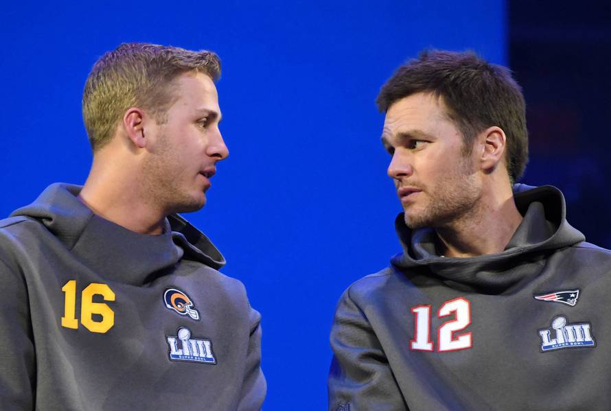 FILE PHOTO: Los Angeles Rams quarterback Jared Goff and New England Patriots quarterback Tom Brady during Opening Night for Super Bowl LIII in Atlanta