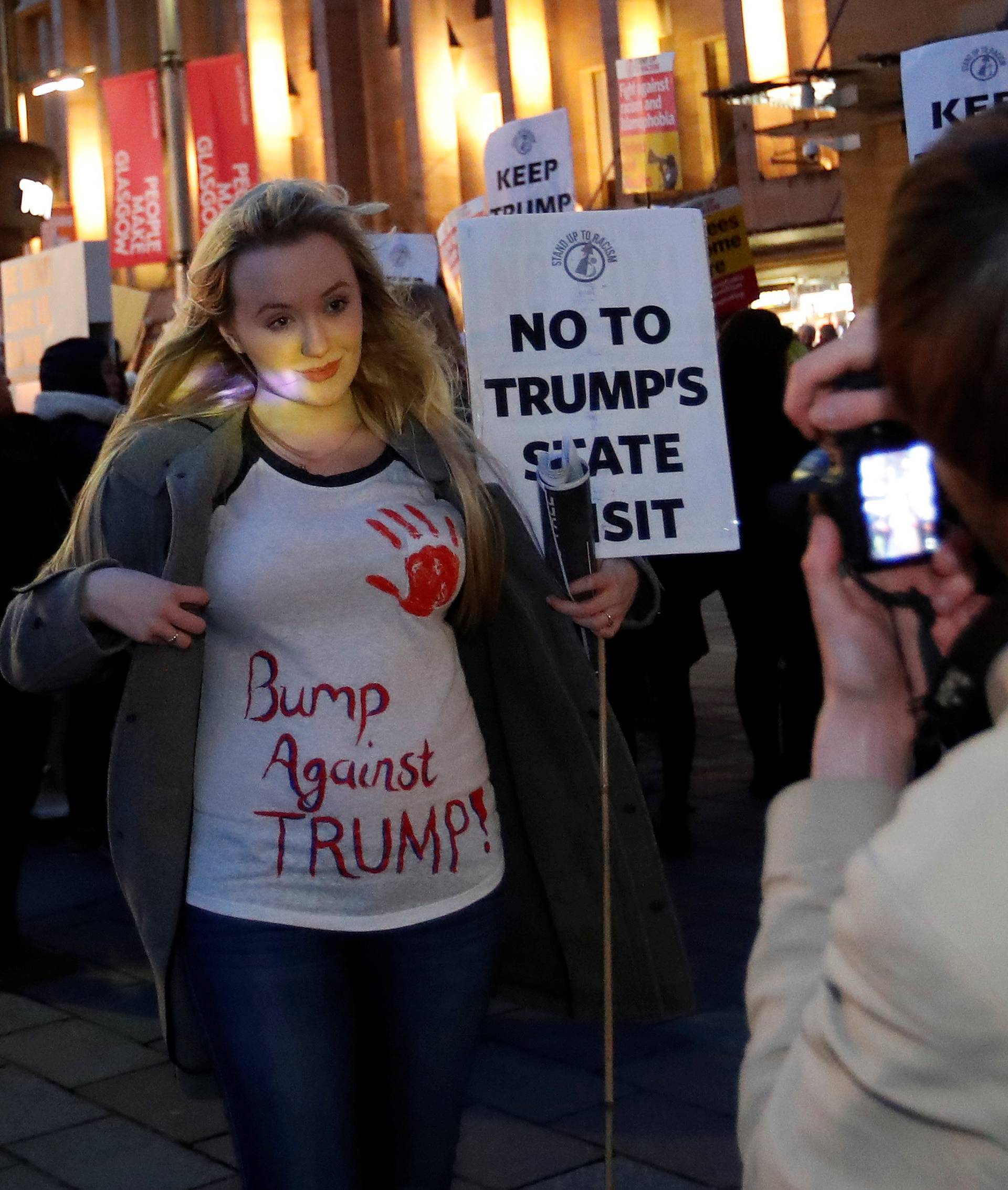 Demonstrators take part in a protest against U.S. President Donald Trump in Glasgow