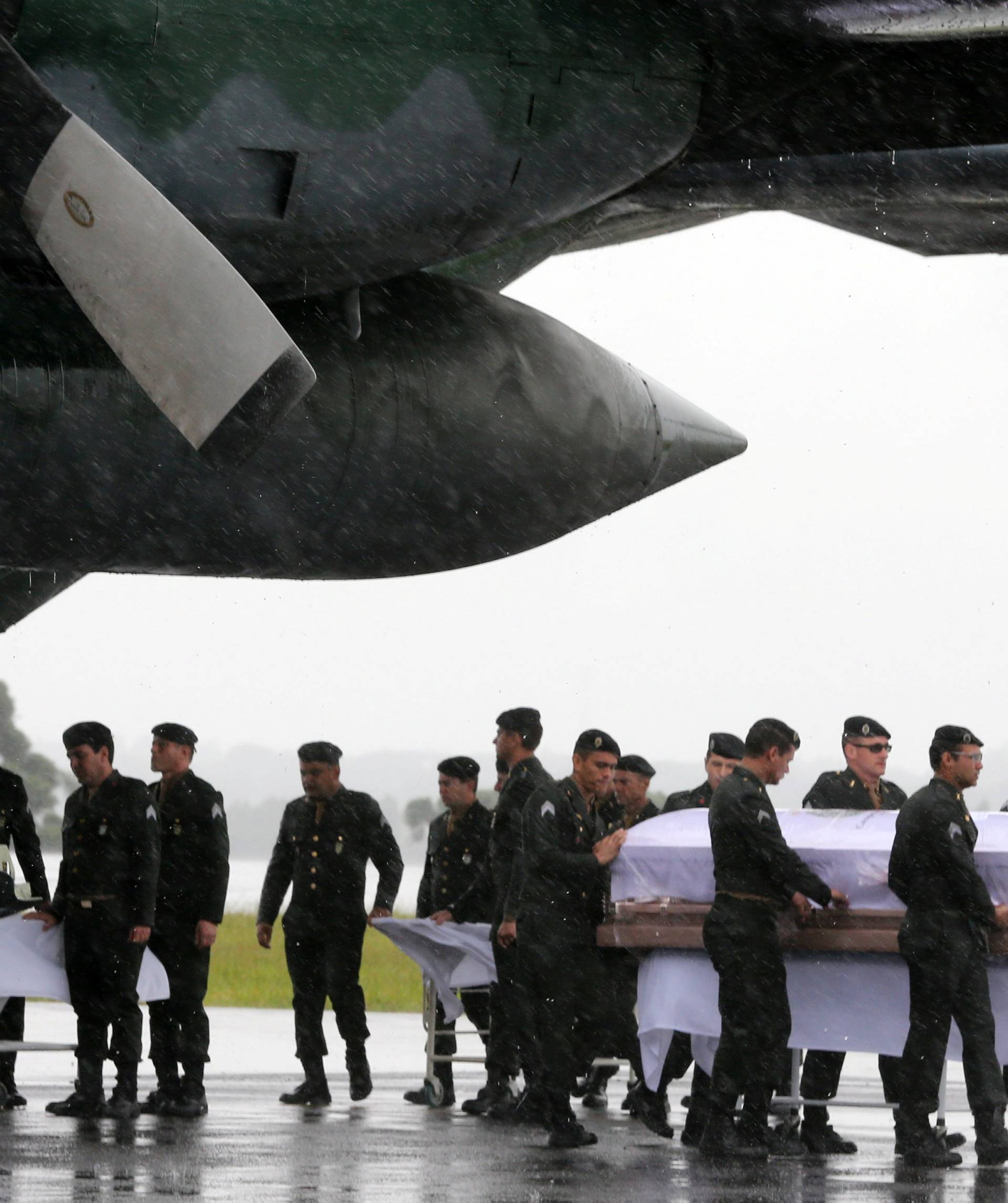 Coffins containing the mortal remains of the victims of the plane crash in Colombia arrive in Chapeco