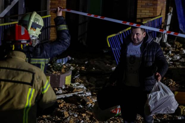 Aftermath of an overnight Russian drone and missile strike in Kyiv