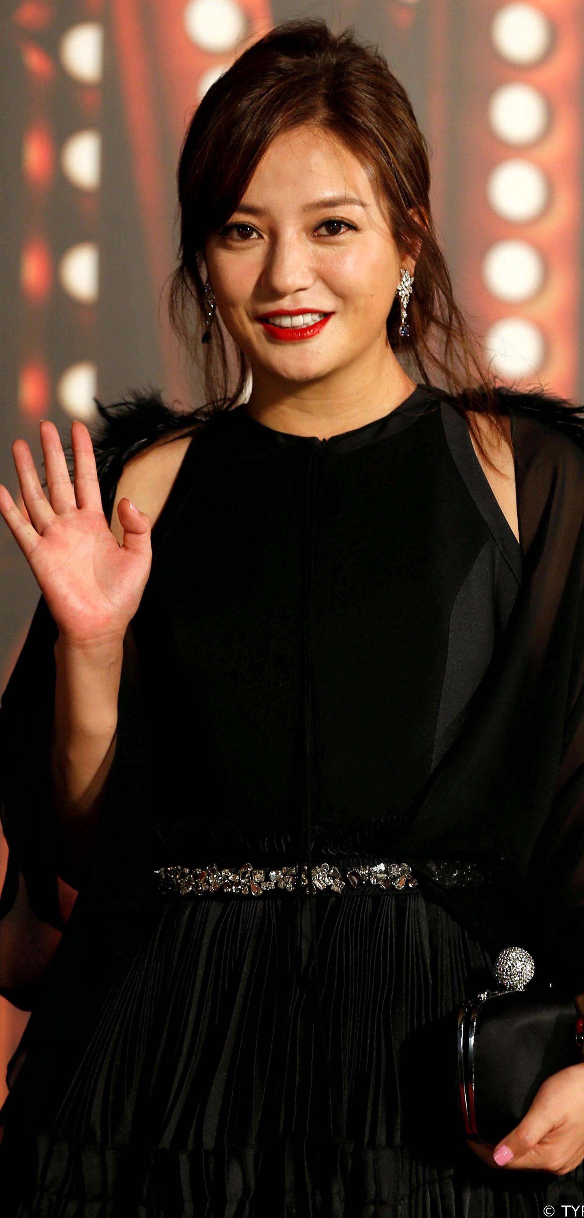 FILE PHOTO: Zhao Wei poses on the red carpet during the 36th Hong Kong Film Awards in Hong Kong, China