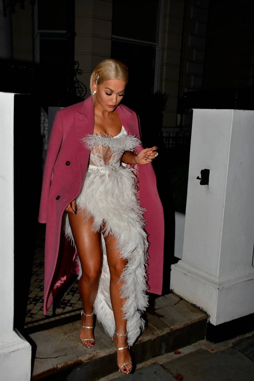 Rita Ora leaving her new Holland Park home
