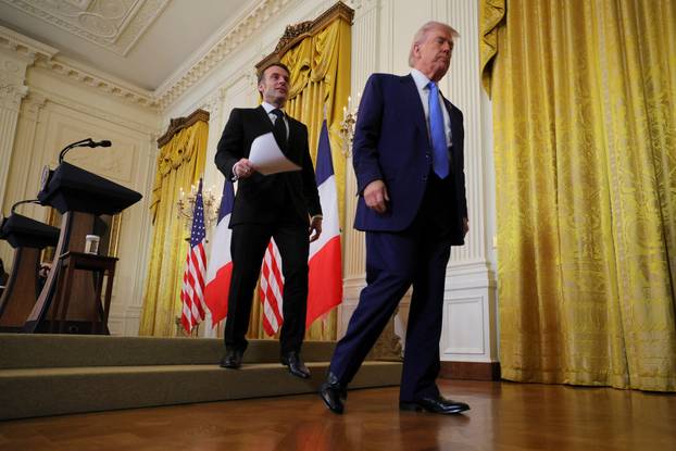 U.S. President Donald Trump and French President Emmanuel Macron attend a press conference at the White House in Washington