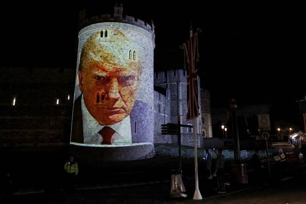 U.S. President Trump's mugshot is projected on Windsor castle