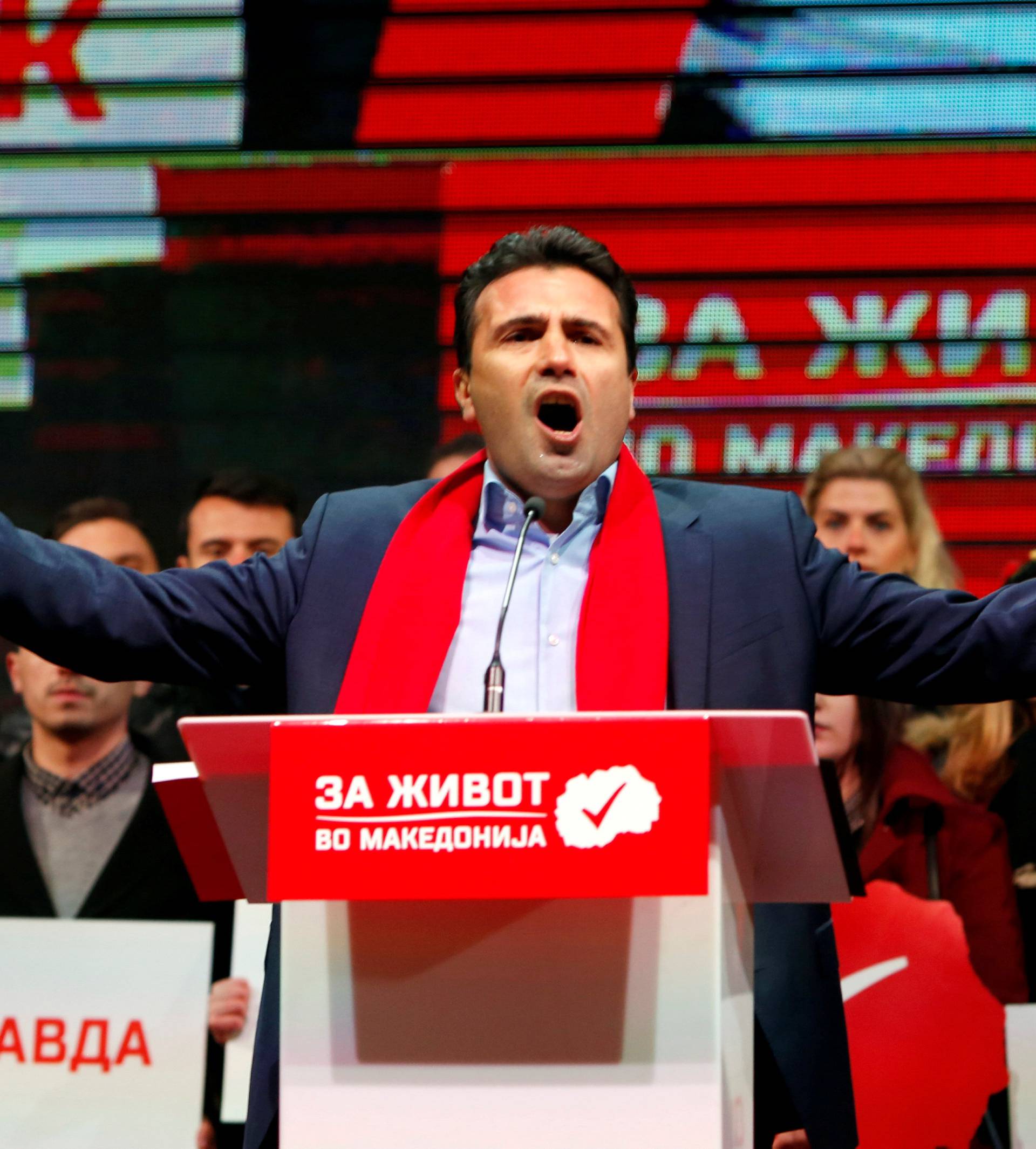 FILE PHOTO: The leader of the biggest opposition party SDSM Zoran Zaev greets supporters during a pre election rally in Skopje