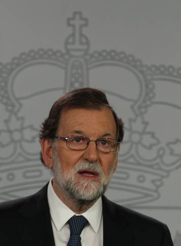 Spain's PM Rajoy delivers an statement at the Moncloa Palace in Madrid