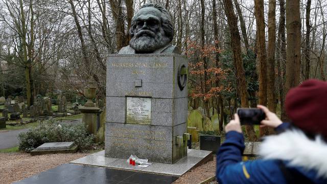 A memorial to German philosopher Karl Marx is seen after it was vandalised at Highgate Cemetery in north London