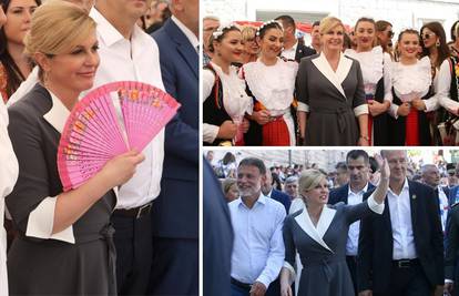 Kolinda u sivoj haljini blistala na Alci, a hladila se lepezom