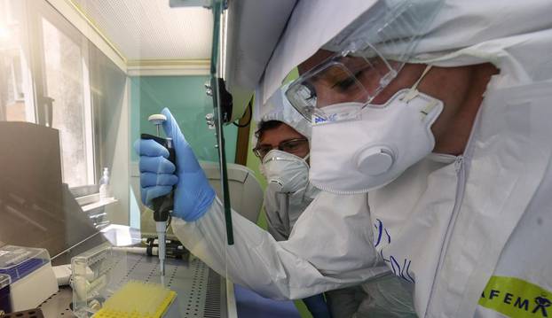 A medical technician works in the laboratory of the Infectious diseases department for coronavirus (COVID-19)