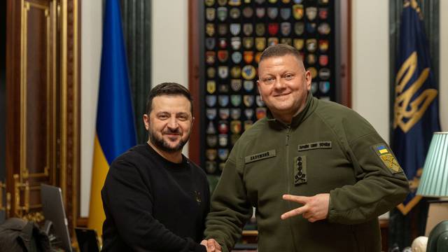 Ukraine's President Zelenskiy and UAF Commander in Chief Zaluzhnyi pose for a picture during a meeting in Kyiv