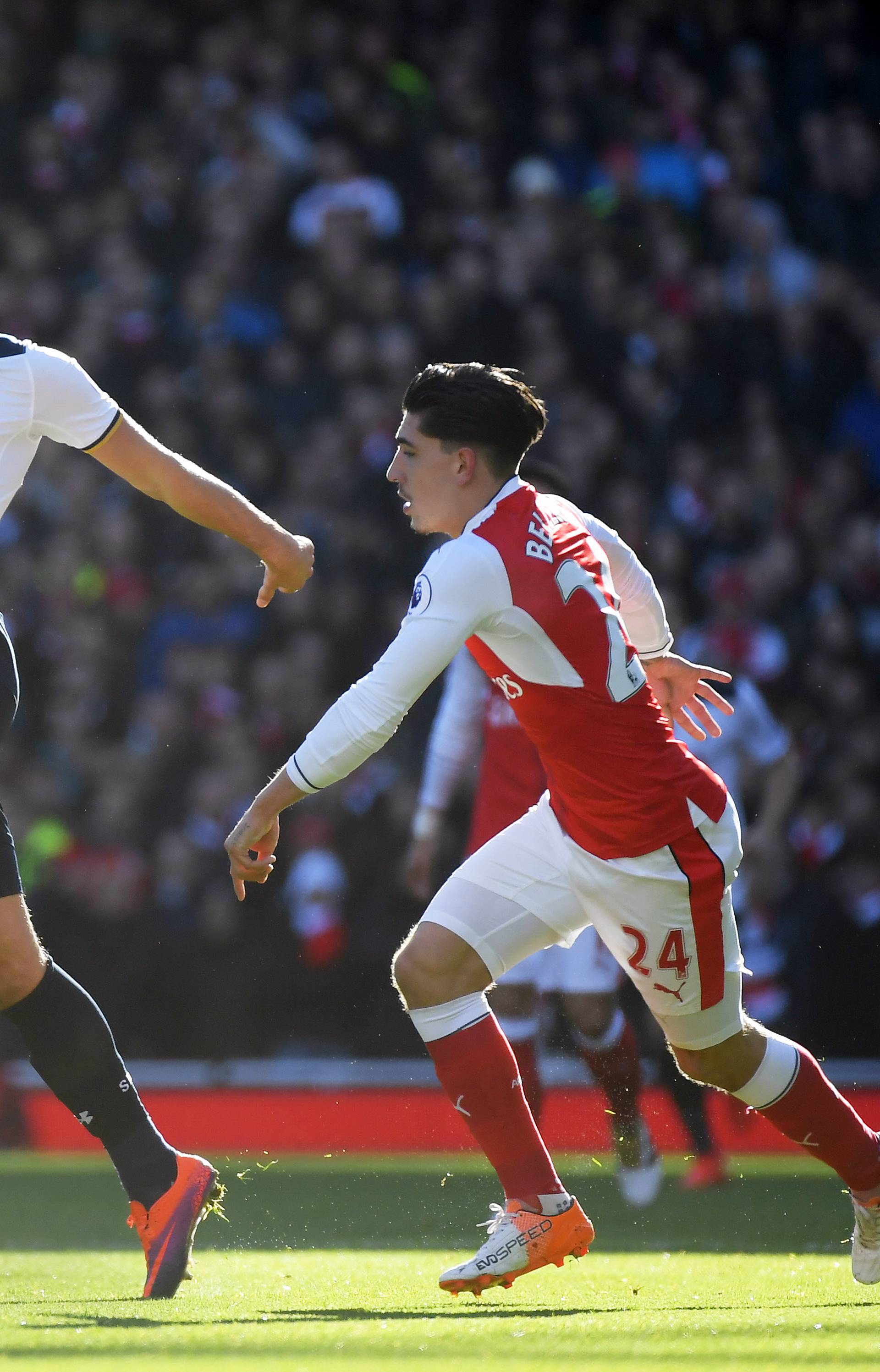 Tottenham's Harry Kane in action with Arsenal's Hector Bellerin