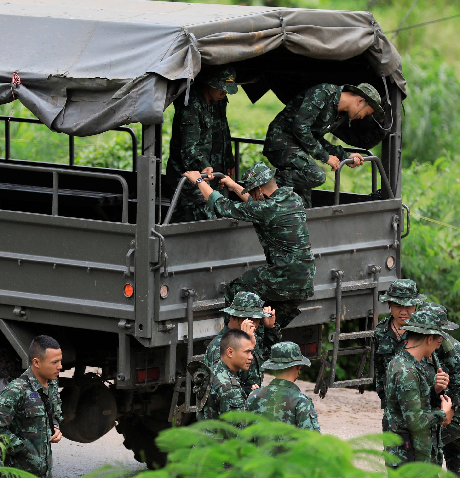 Soldiers arrive at Tham Luang cave complex in the northern province of Chiang Rai