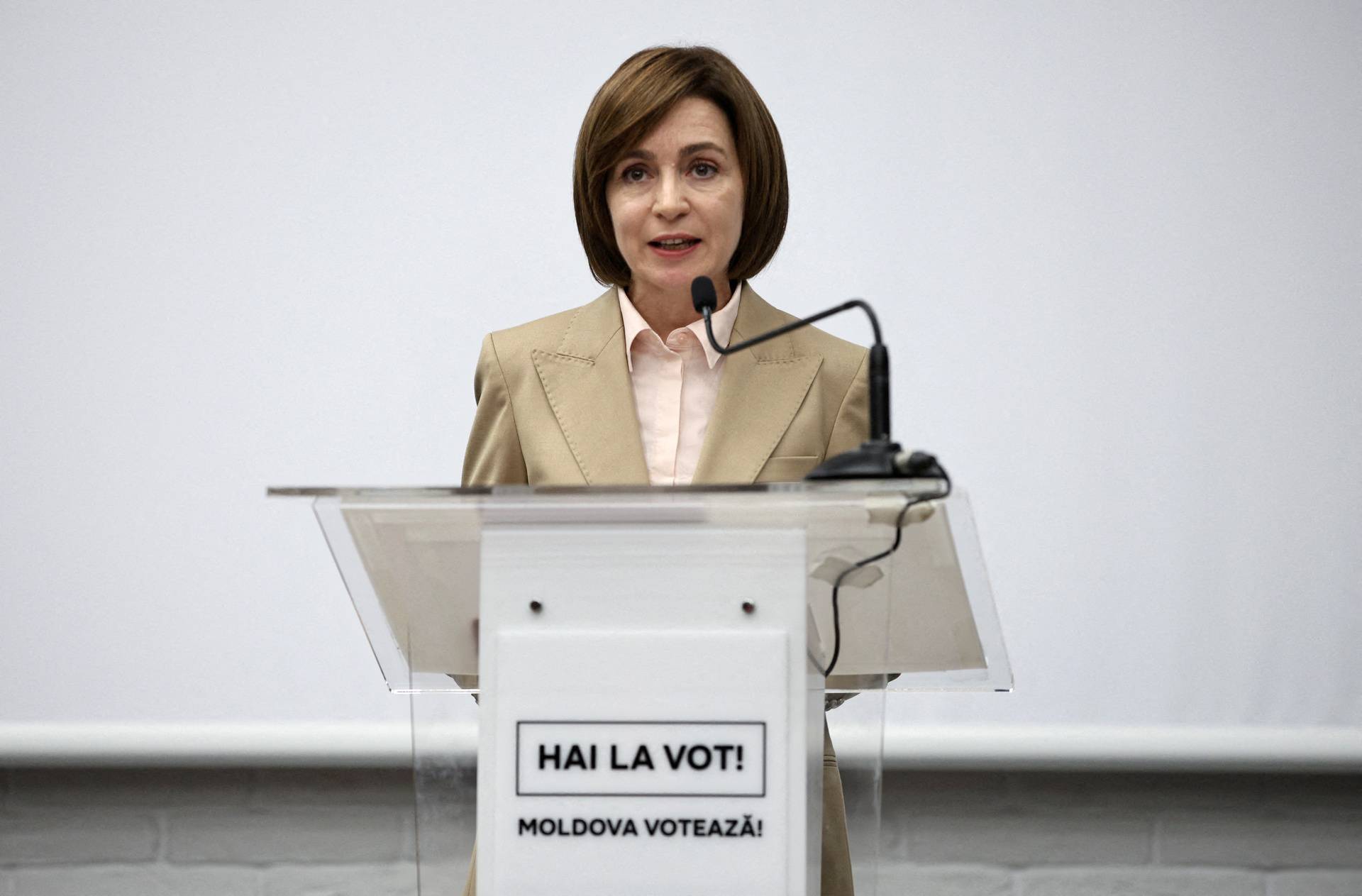 Moldova's incumbent President and presidential candidate Maia Sandu attends a news briefing in Chisinau