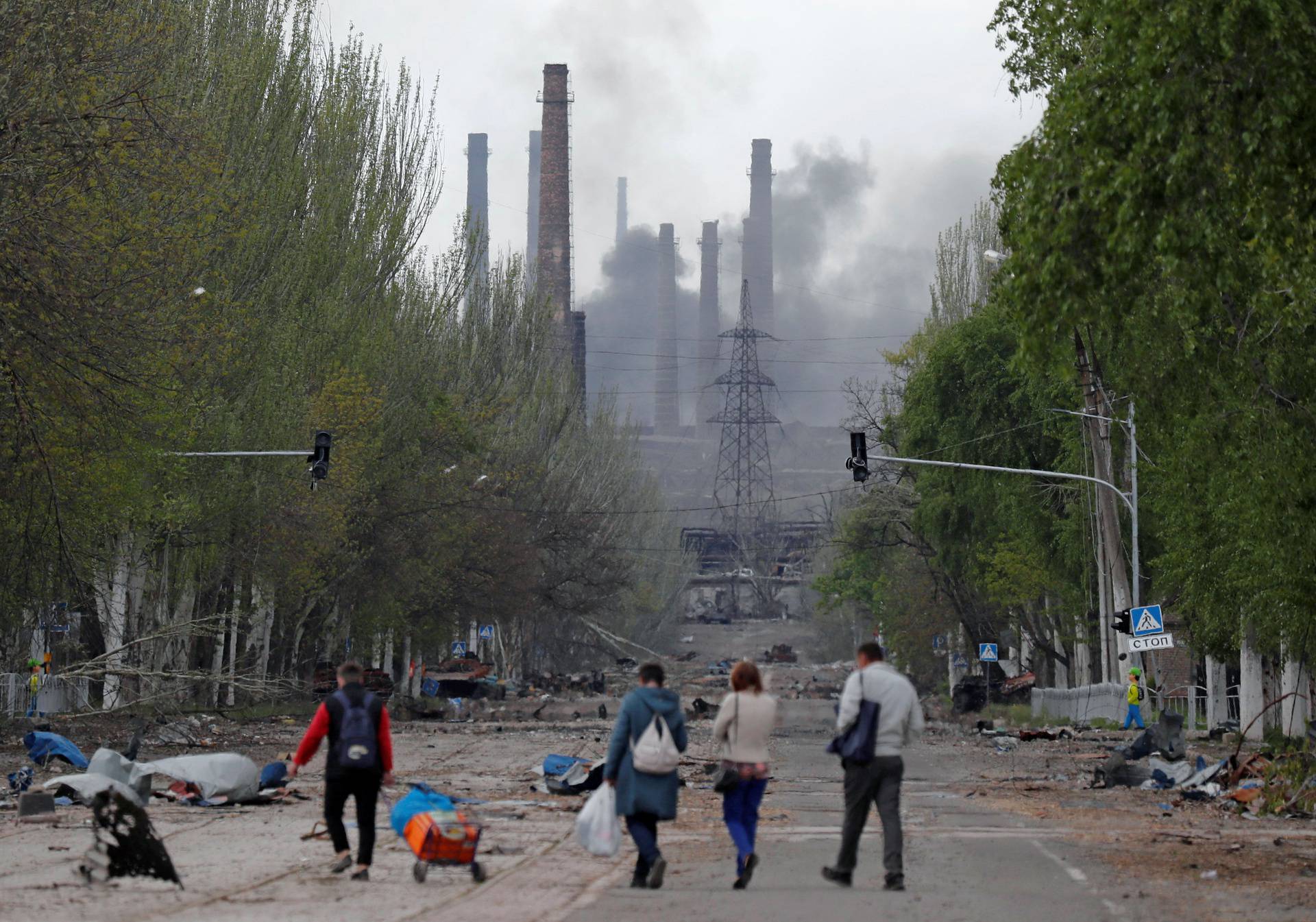 Smoke rises above a plant of Azovstal Iron and Steel Works in Mariupol