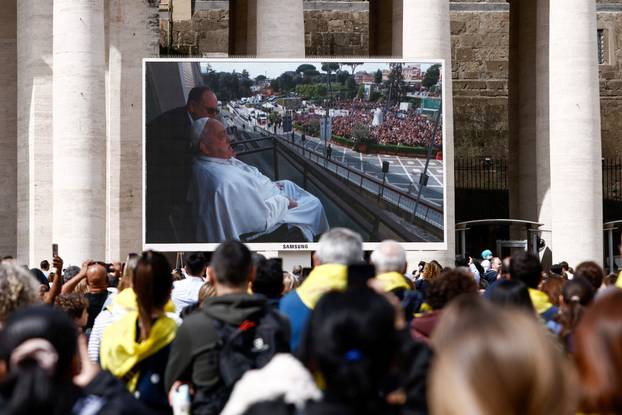 Pope Francis makes first public appearance in five weeks, on a big screen in St. Peter's Square, at the Vatican