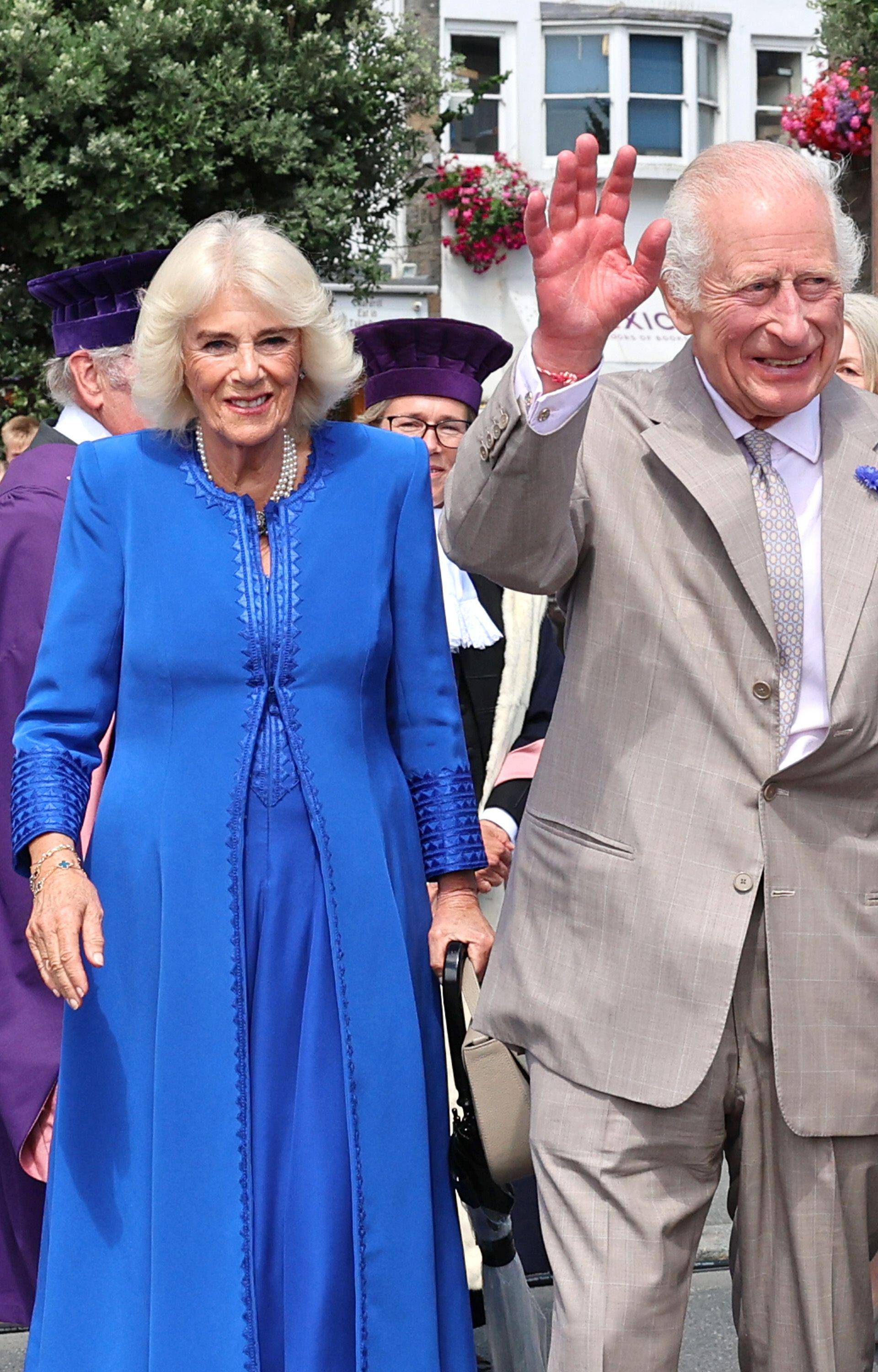 Queen Camilla and King Charles III meeting well-wishers as they arrive to attend the special sitting of the States of Deliberation, at the Guernsey Parliament in Saint Peter Port, Guernsey, during a two day visit to the Channel Islands. Picture date: Tues