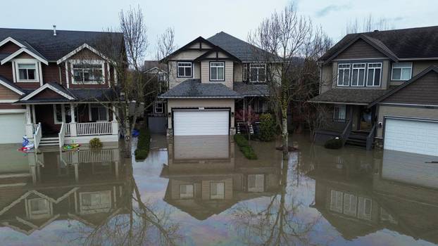 Floodwaters trigger evacuations and highway closures in British Columbia's Fraser Valley