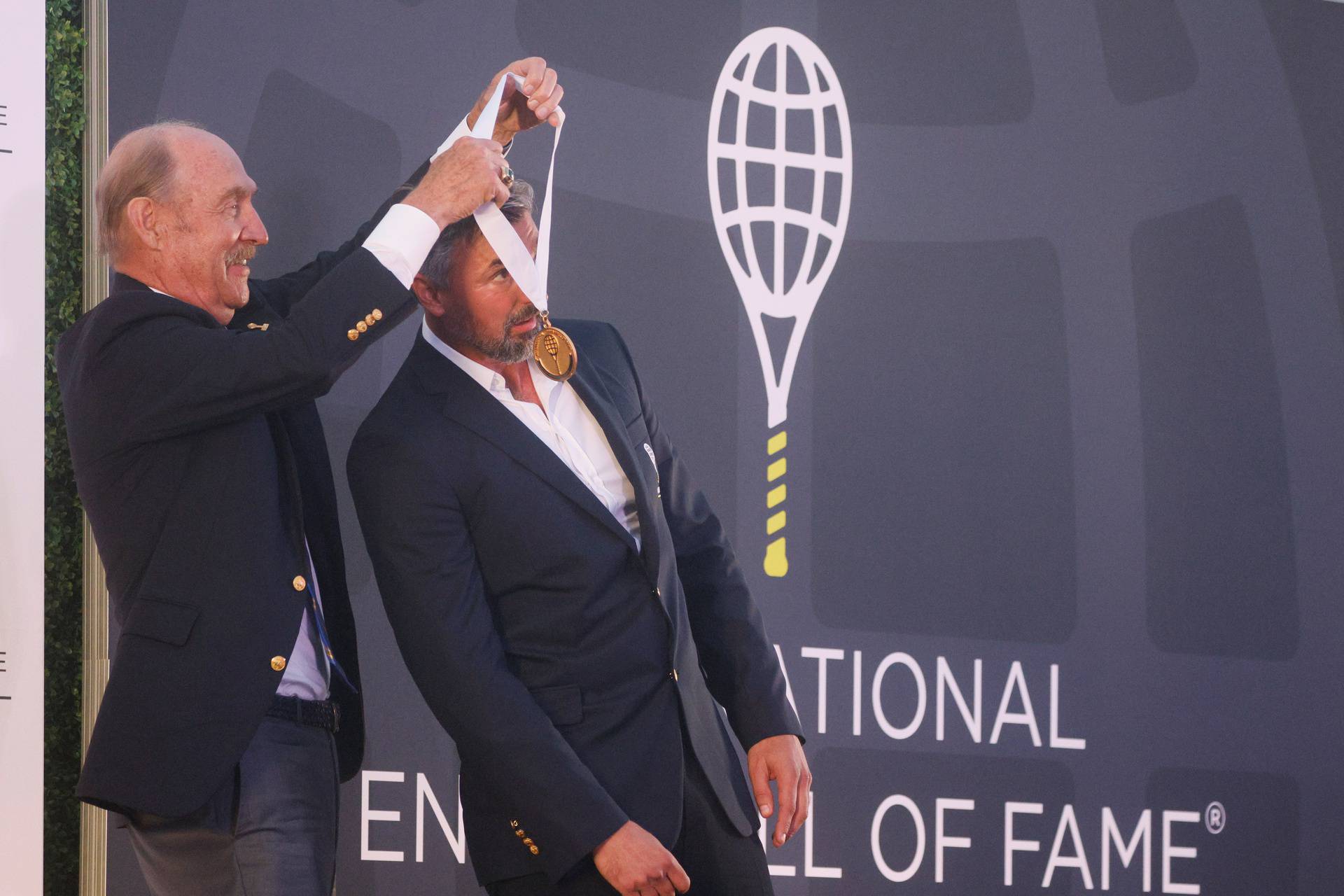 Goran Ivanisevic of Croatia is inducted into the International Tennis Hall of Fame in Newport