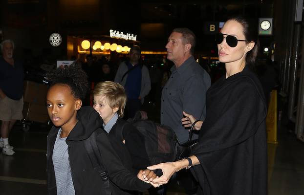 Angelina Jolie and the kids are a family that travels together