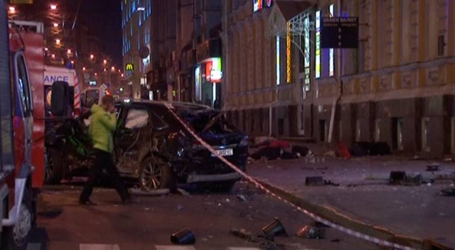 A still image taken from a video shot on October 18, 2017, shows a damaged sport utility vehicle at the accident scene after a car drove into pedestrians following a vehicle collision in central Kharkiv
