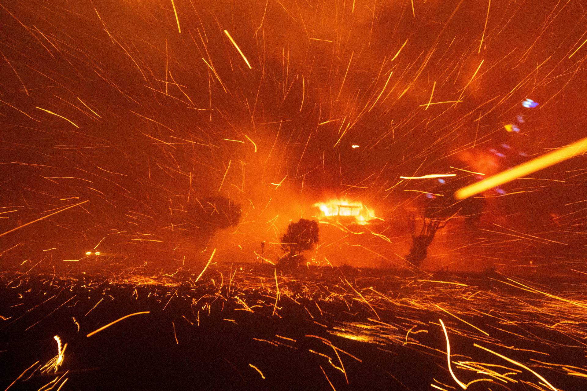 Palisades Fire burns during a windstorm on the west side of Los Angeles