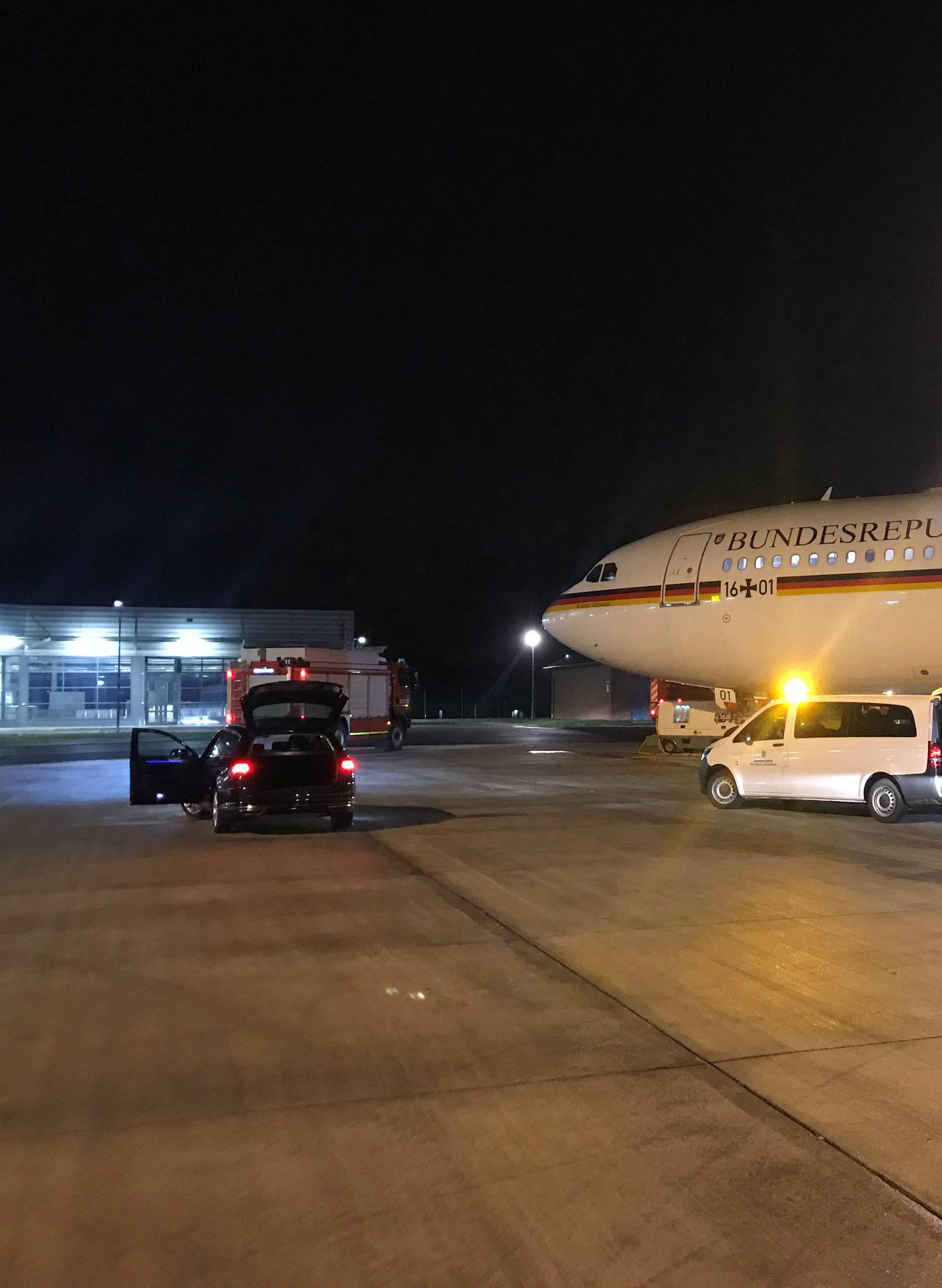 The Airbus A340 government aircraft carrying Chancellor Angela Merkel and the German delegation to the G20 summit in Buenos Aires which was forced to land shortly after taking off from Berlin sits at the Cologne-Bonn airport
