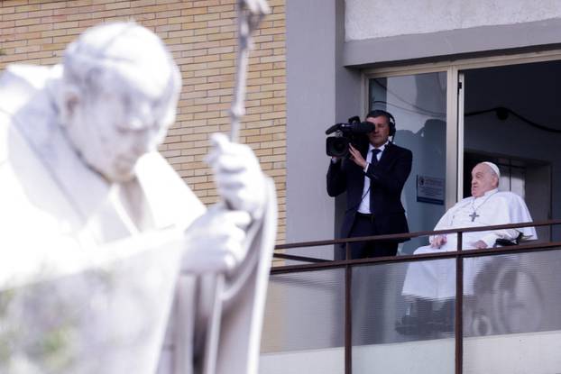 Pope Francis' first public appearance in five weeks on the day of his discharge from Gemelli hospital, in Rome