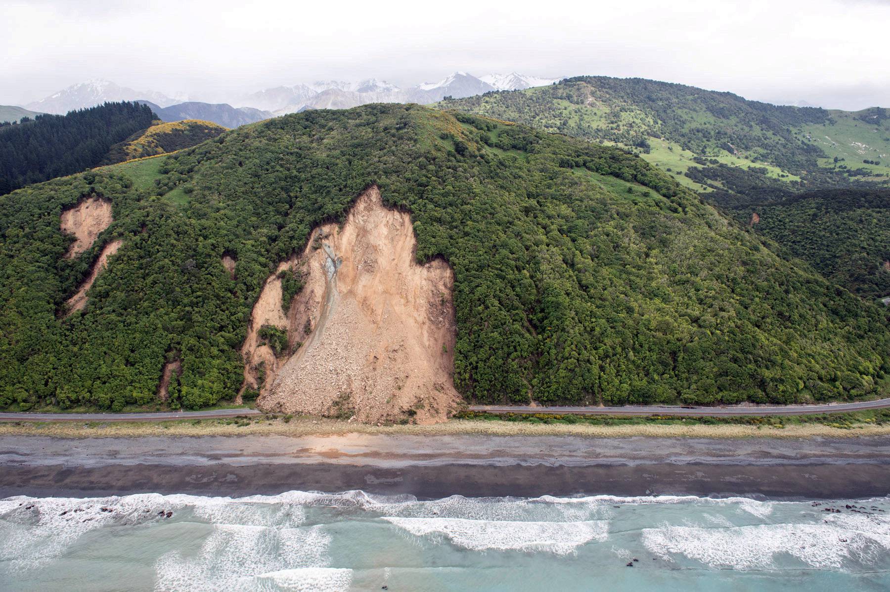 Landslides block State Highway One near Kaikoura on the upper east coast of New Zealand's South Island following an earthquake