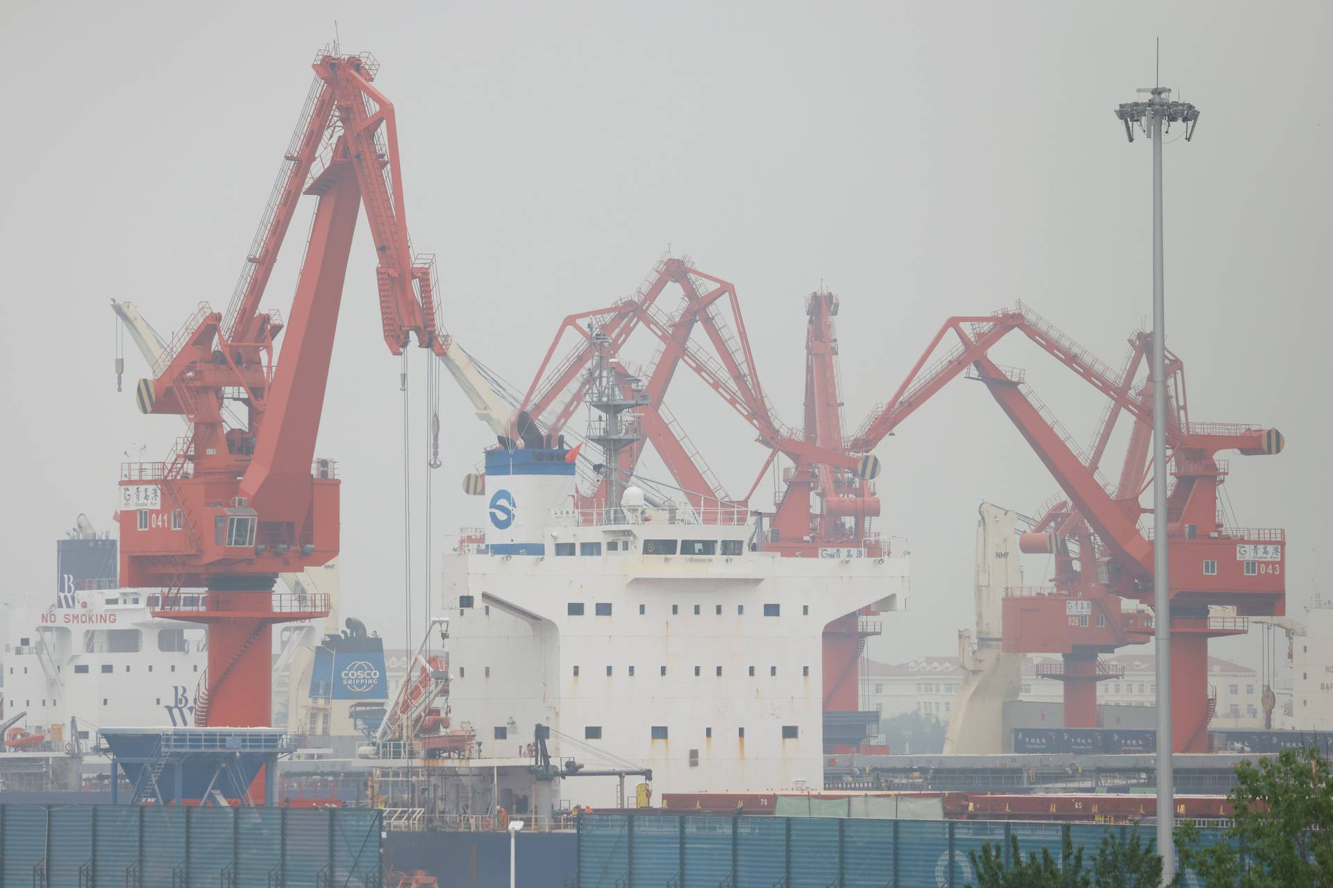 Cranes are seen at the port of Qingdao