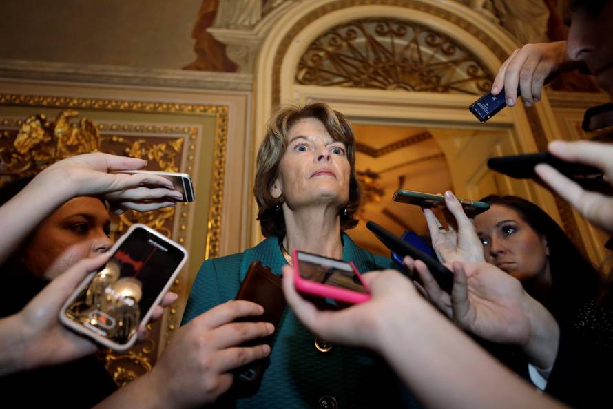 U.S. Senator Murkowski talks to reporters about her no vote on Kavanaugh nomination vote on Capitol Hill in Washington