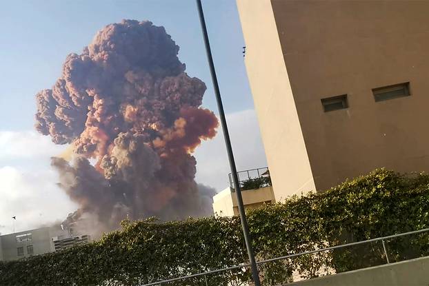 Smoke rises after an explosion in Beirut