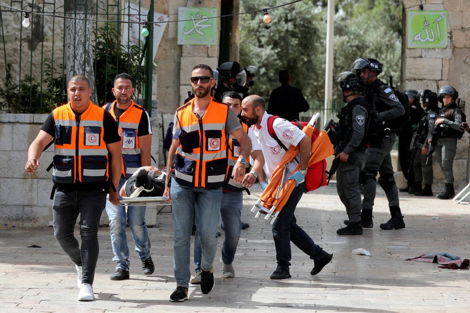 Israeli police clash with Palestinians at the compound that houses Al-Aqsa Mosque in Jerusalem