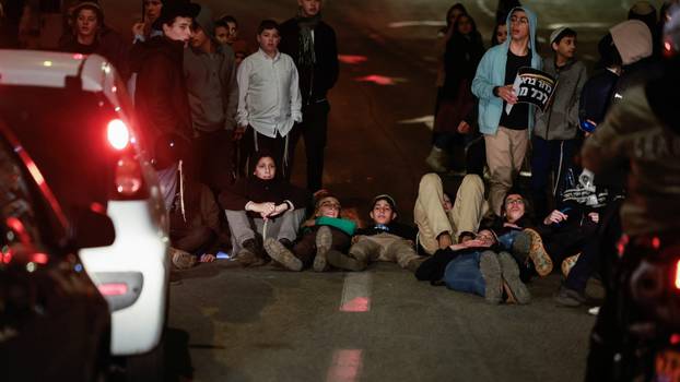 Israelis protest a ceasefire deal, in Jerusalem