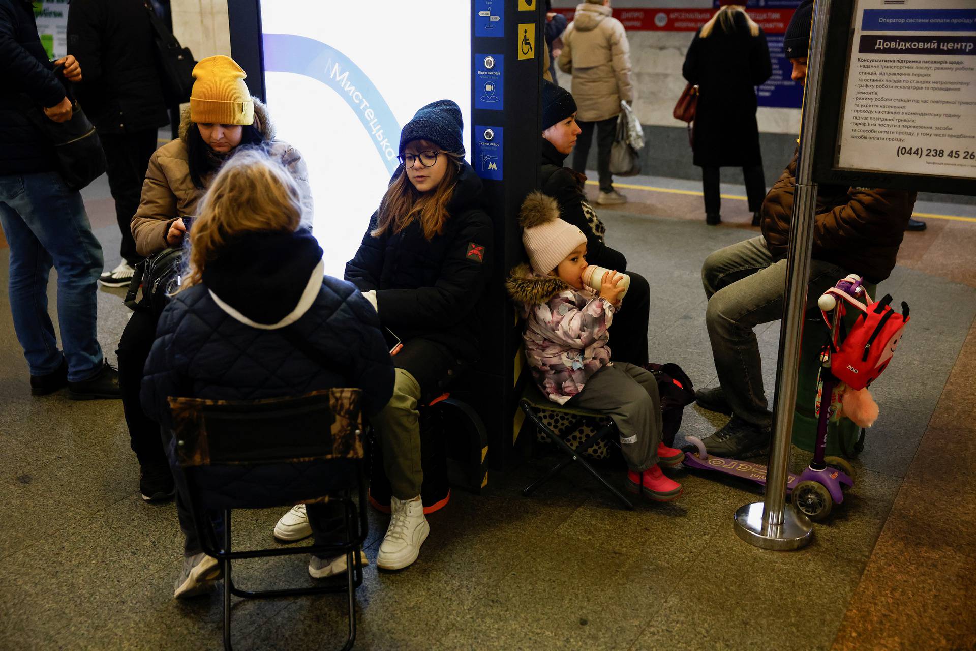 People take shelter during a Russian missile and drone attack, in Kyiv