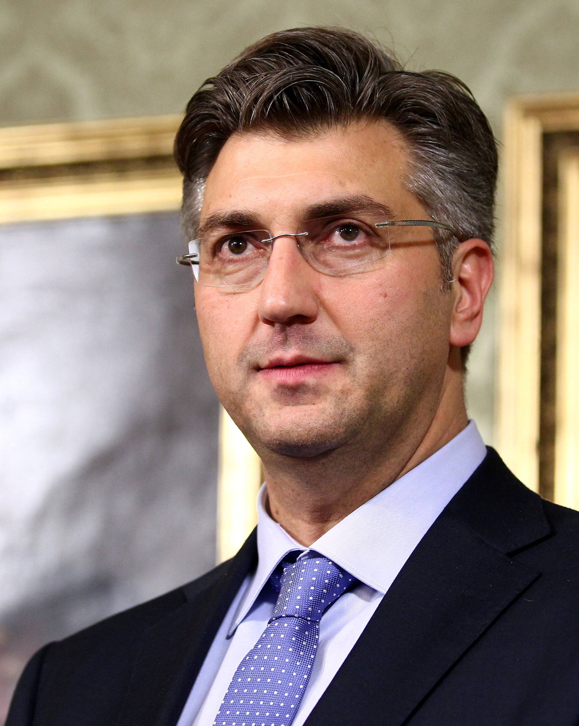 Croatia's new Prime Minister Andrej Plenkovic speaks in government buillding in Zagreb