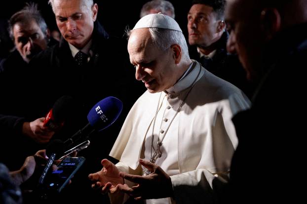 FILE PHOTO: Pope Leo leaves the papal residence to head back to the Vatican, in Castel Gandolfo