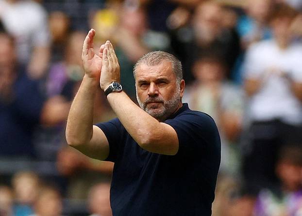 FILE PHOTO: Tottenham Hotspur manager Ange Postecoglou applauds fans before a pre-season friendly against Shakhtar Donetsk
