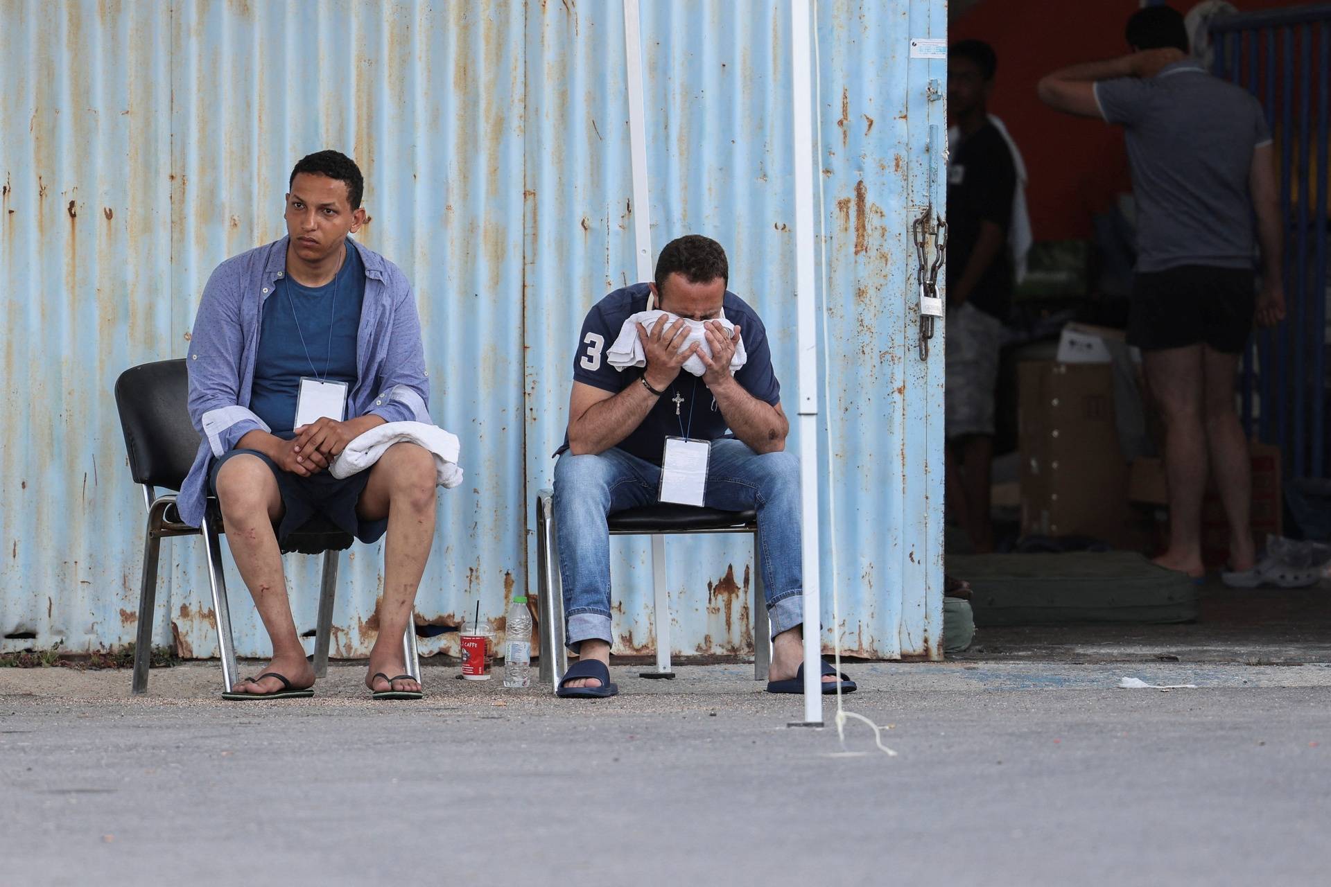 Rescued migrants at the port of Kalamata following a rescue operation