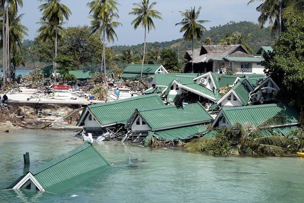 FILE PHOTO: Submerged buildings near the pier at Ton Sai Bay in Thailand