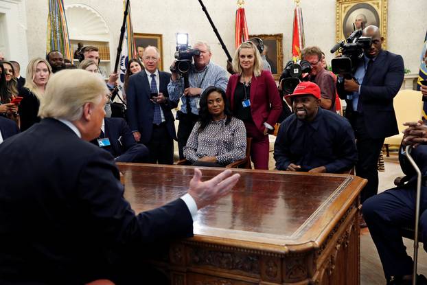 President Trump speaks during a meeting with rapper Kanye West and others in the Oval Office at the White House in Washington