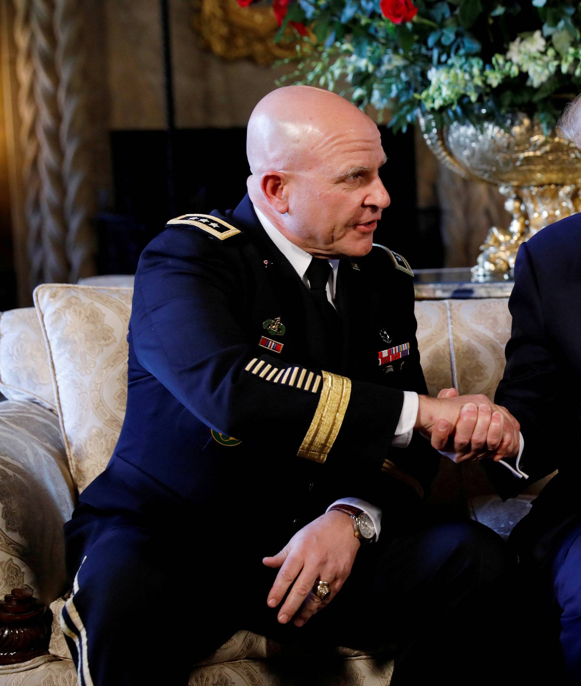 FILE PHOTO - U.S. President Donald Trump shakes hands with his new National Security Adviser Army Lt. Gen. H.R. McMaster after making the announcement at his Mar-a-Lago estate in Palm Beach